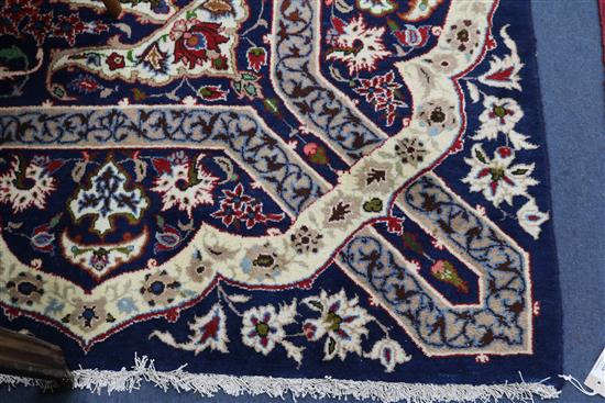 A Tabriz blue ground carpet, 410 x 272cm